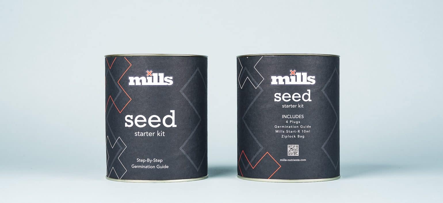 Mills Seed Starter Kit showing front and back of black tin with red and white design