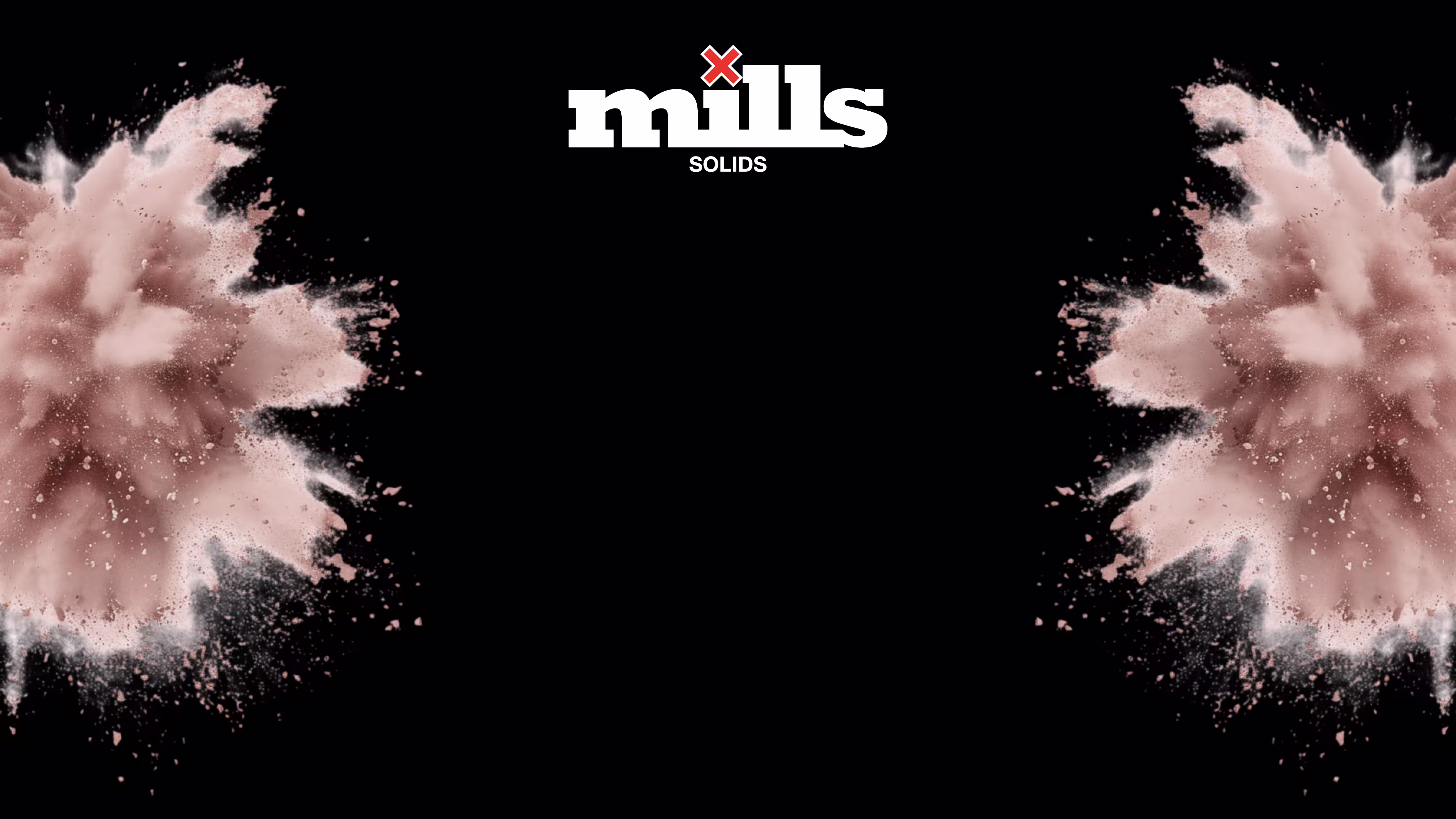 Mills Solids logo on a black background with powdered nutrient bursts on both sides